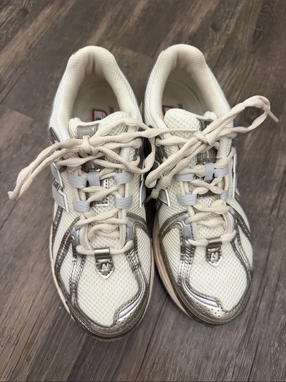 New Balance Women’s Cream and Metallic Silver Athletic Sneakers 1906